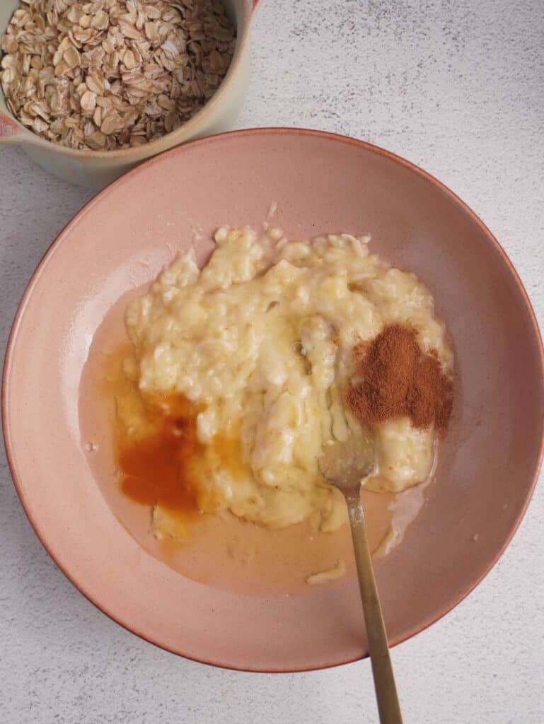 A bowl with mashed banana and egg whites.